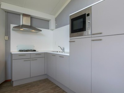 Holiday park Chalet by Dutch Coast with Private Garden - Features photo 16