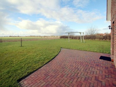 Holiday house Ferienhaus am Deichtor in Neßmersiel - Outdoor photo 2