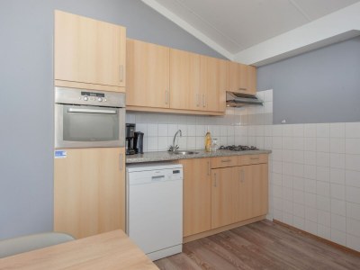 Holiday park Bungalow by North Sea Beach with Private Garden - Features photo 6