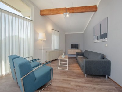 Holiday park Bungalow by North Sea Beach with Private Garden - Features photo 10