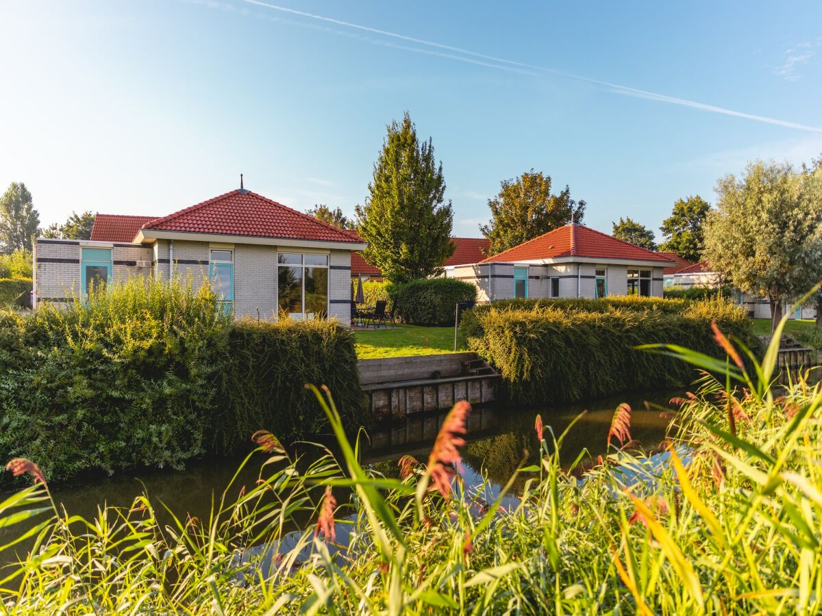 Holiday park Villa in Netherlands with Private Jetty