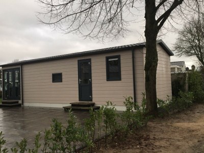 Holiday park Chalet with dishwasher in a park - Outdoor photo 6