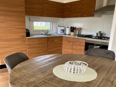 Holiday park Chalet with dishwasher in a park - Features photo 7