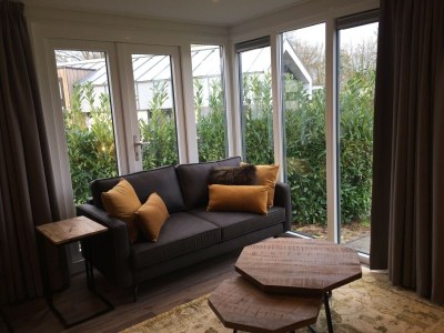 Holiday park Chalet with dishwasher in a park - Features photo 10