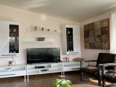 Holiday park Chalet with dishwasher in a park - Features photo 11