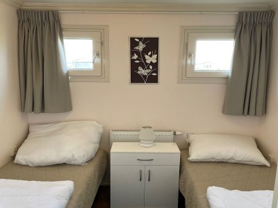 Holiday park Chalet with dishwasher in a park - Features photo 12