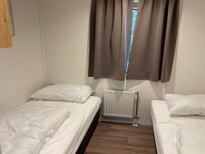 Holiday park Chalet with dishwasher in a park - Features photo 15