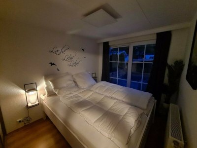 Holiday park Chalet with dishwasher in a park - Features photo 16