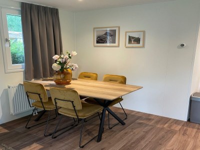 Holiday park Chalet with dishwasher in a park - Features photo 17