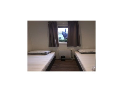 Holiday park Chalet with dishwasher in a park - Features photo 21
