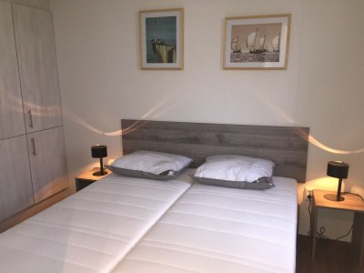 Holiday park Chalet with dishwasher in a park - Features photo 24