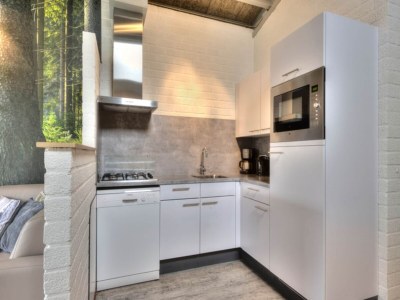 Holiday park Bungalow in Weerterbergen with Garden & Fireplace - Features photo 6