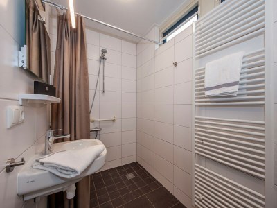 Holiday park Bungalow in Weerterbergen with Garden & Fireplace - Features photo 7