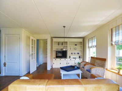 Holiday park Villa im Wieringer Stil mit Whirlpool - Features photo 10