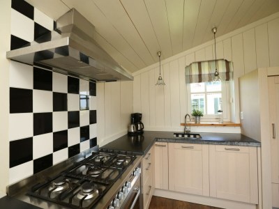 Holiday park Villa im Wieringer Stil mit Whirlpool - Features photo 13