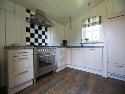 Holiday park Villa im Wieringer Stil mit Whirlpool - Features photo 14