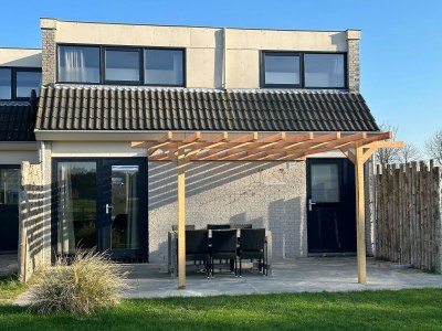 Holiday park Holiday Home on Texel Island with Terrace - Outdoor photo 2