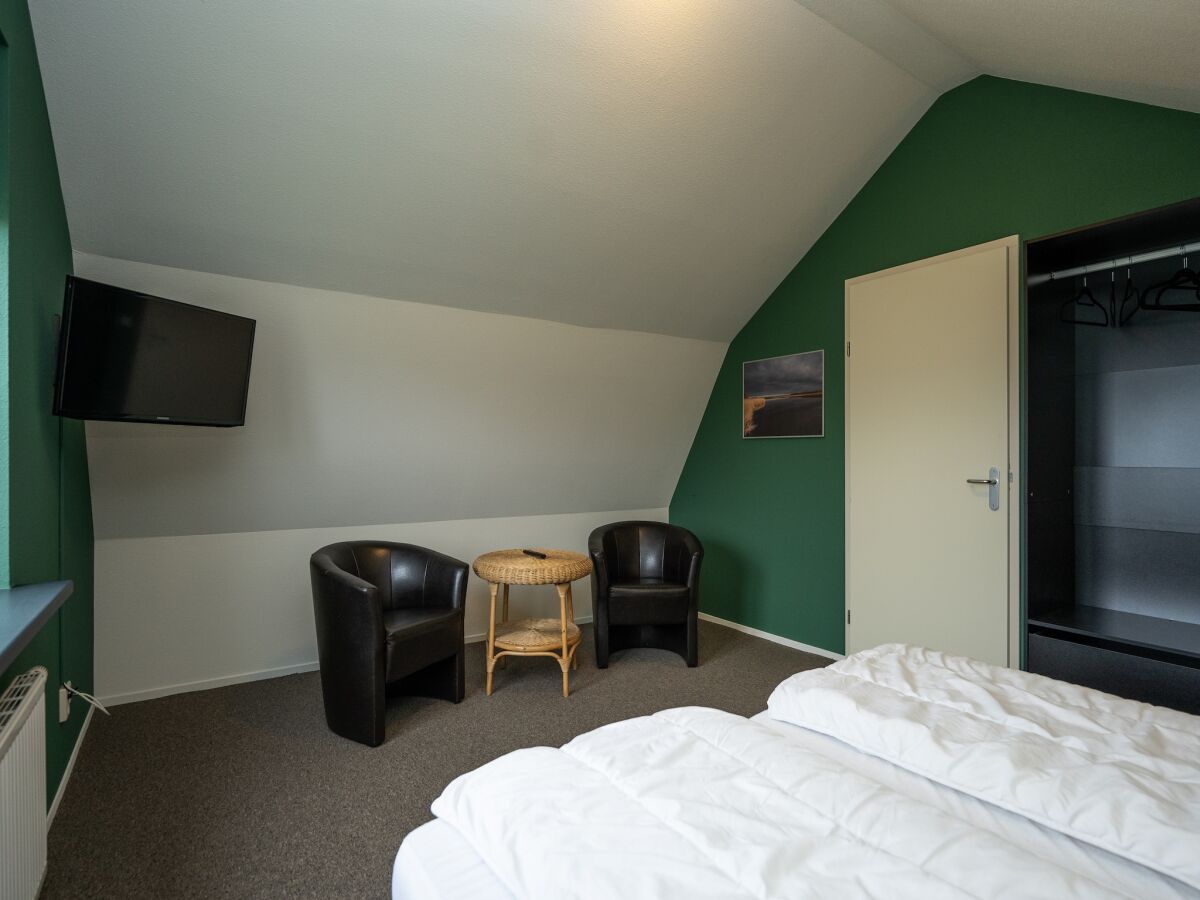 Holiday park Holiday Home on Texel with Stunning Views - Features photo 4