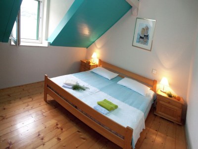 Holiday house Beautiful holiday home on the island Brac, with the sea and a small beach in front of the door! - Features photo 19