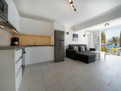 Apartment with terrace, sea view, and heated pool - Features photo 13