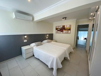 Apartment with terrace, sea view, and heated pool - Features photo 16
