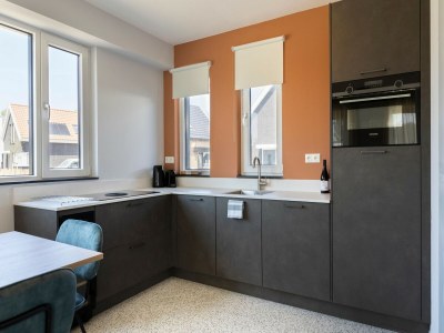 Holiday park Modern Retreat Near Beach - Features photo 19