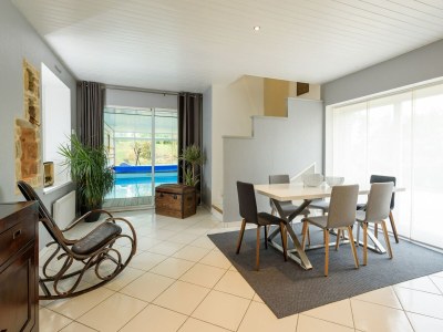 Holiday house Spacious holiday home with heated indoor pool - Features photo 21