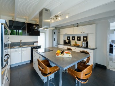 Holiday house Spacious holiday home with heated indoor pool - Features photo 24