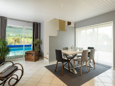 Holiday house Spacious holiday home with heated indoor pool - Features photo 26