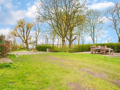 Holiday house Gemütliches Ferienhaus in Sint Maartensvlotbrug mit gemeinsamer Terrasse - Outdoor photo 6