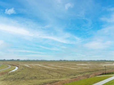 Holiday house Amazing holiday home in Lauwersoog with sauna - Environment photo 33