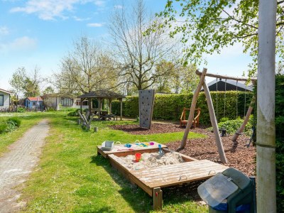 Holiday house Luxury chalet near Ouddorp with garden - Outdoor photo 7