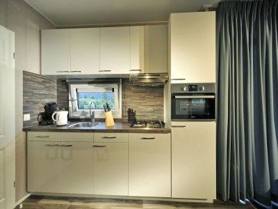 caravan Chalet in Tyrol near Ski Slopes - Features photo 6