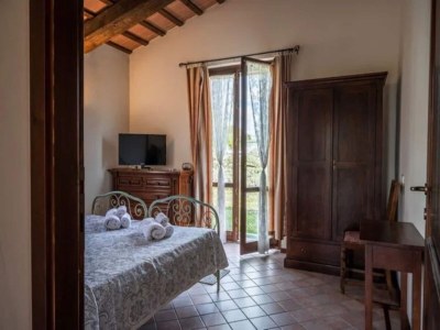 Apartment Holiday Home in Urbania with Garden BBQ - Features photo 9