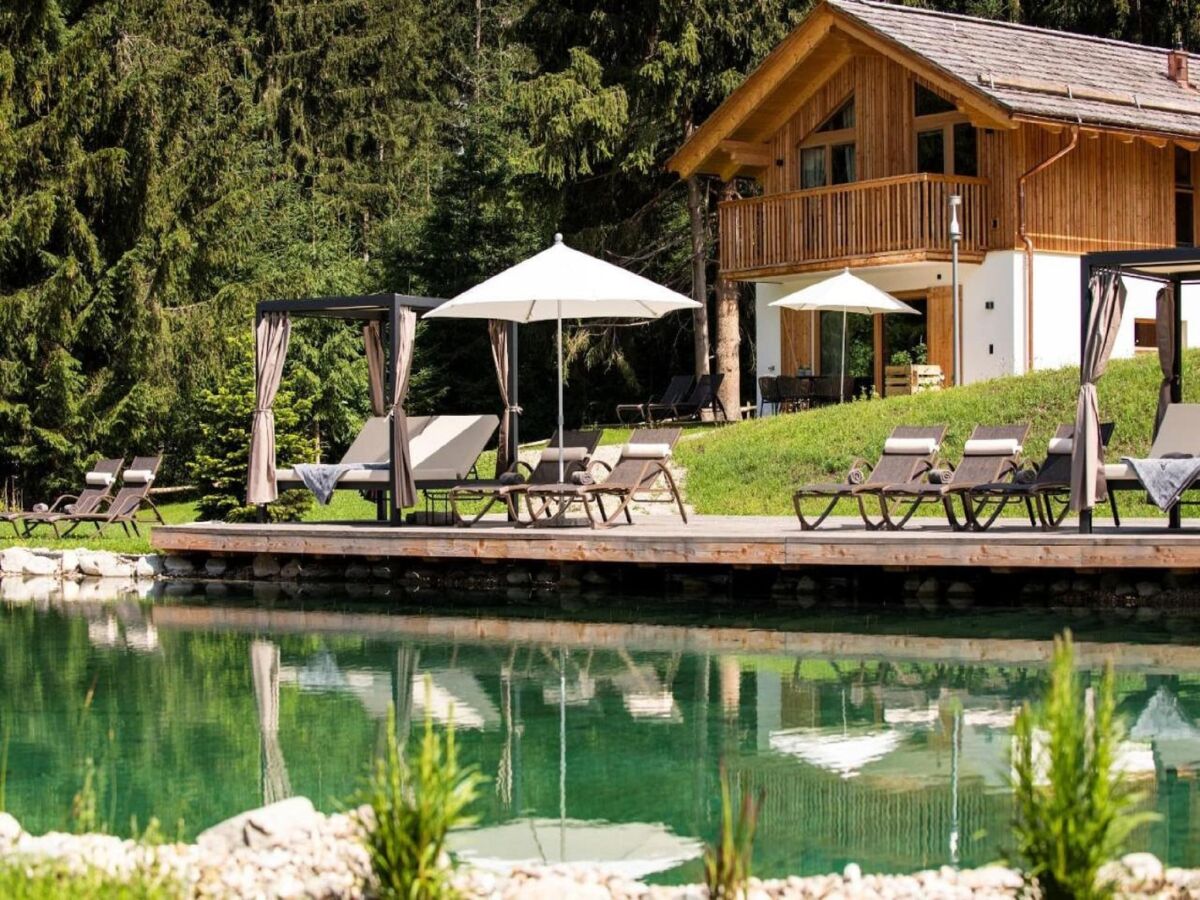 Chalet Gemütliches Chalet in Wölting mit Naturbadeteich