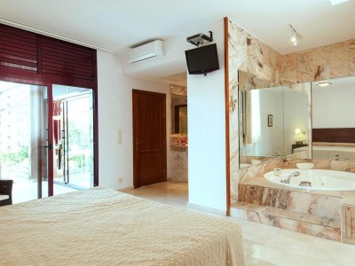 Holiday park Ferienhaus in Puerto Rico mit Garten - Features photo 9