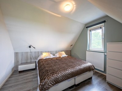 Holiday house Holiday home near dunes with wellness garden - Features photo 11