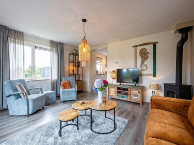 Holiday house Holiday home near dunes with wellness garden - Features photo 15