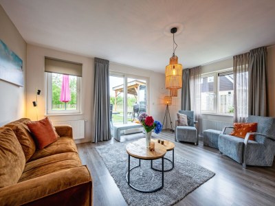 Holiday house Holiday home near dunes with wellness garden - Features photo 16