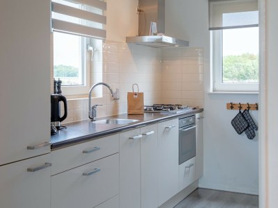 Holiday house Holiday home near dunes with wellness garden - Features photo 17