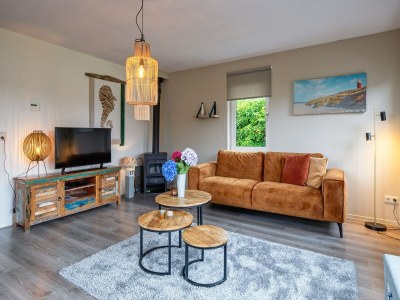 Holiday house Holiday home near dunes with wellness garden - Features photo 22