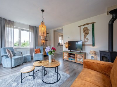 Holiday house Holiday home near dunes with wellness garden - Features photo 27