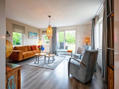 Holiday house Holiday home near dunes with wellness garden - Features photo 28