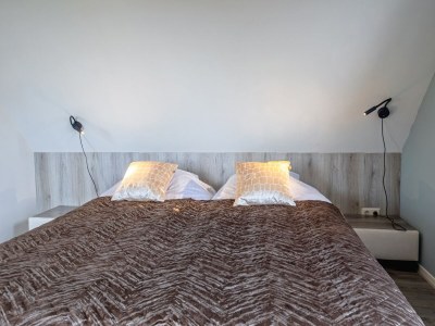 Holiday house Holiday home near dunes with wellness garden - Features photo 29