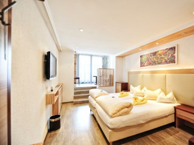 Holiday room Familienzimmer Deluxe mit Halbpension - Features photo 45