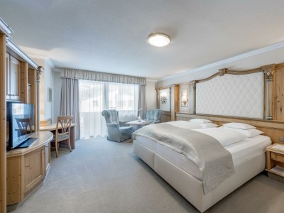 Holiday room DOPPELZIMMER DE LUXE mit Halbpension - Features photo 23