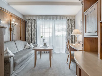 Holiday room DOPPELZIMMER GRAND LIT mit Halbpension - Features photo 25