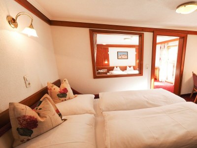 Holiday room Familienzimmer mit getrennten Schlafräumen - Features photo 25