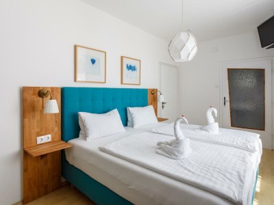 Holiday room Doppelzimmer mit Boxspringbett Hofseite (Zi 5) - Features photo 29