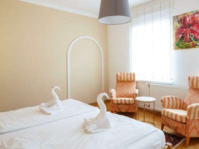 Holiday room Deluxe Suite mit Kingsize Bett, 2 Schlafräume - Features photo 33